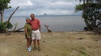 Gregg & Lenora on Taha'a with Bora Bora in background
